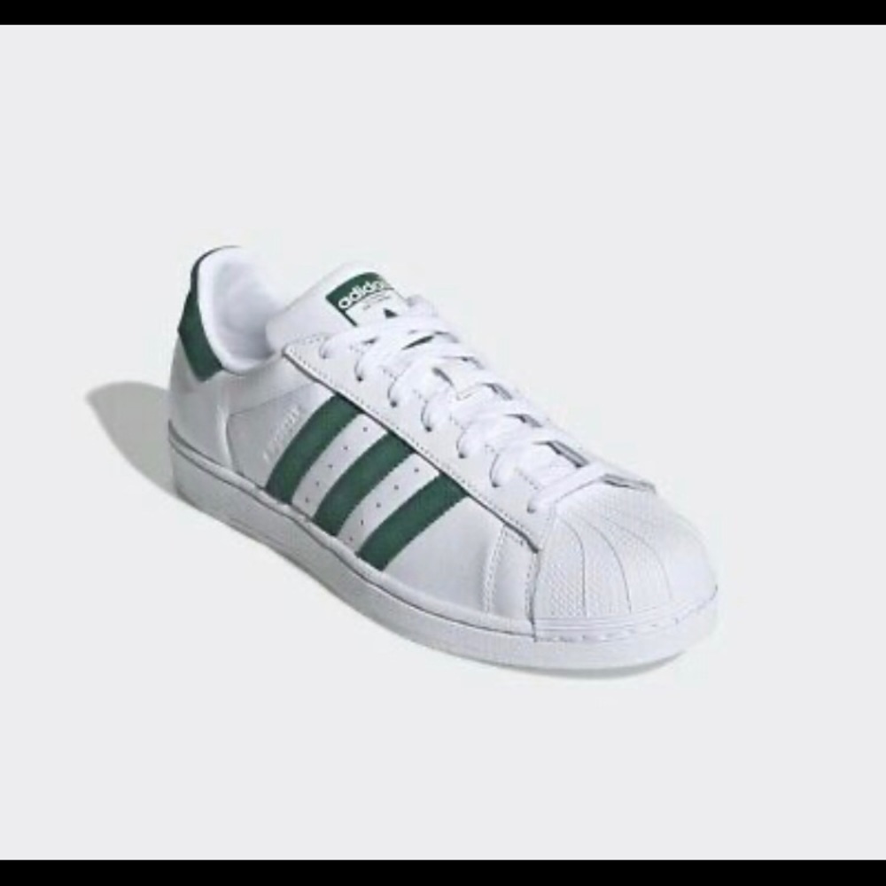 White/green adidas superstars